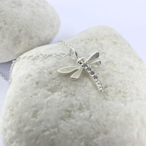 Stunning silver anklet of a dragonfly with cubic zirconia stones detail.