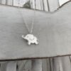 Cute sterling silver elephant charm on a silver ankle bracelet.