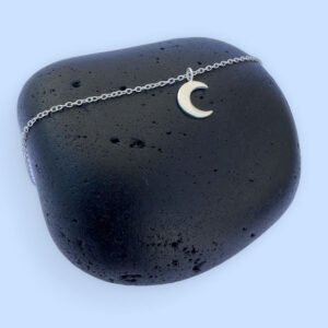 Stunning silver anklet with a crescent moon charm.