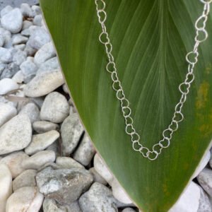 Cute anklet made up of identical sterling silver interlinked hearts.